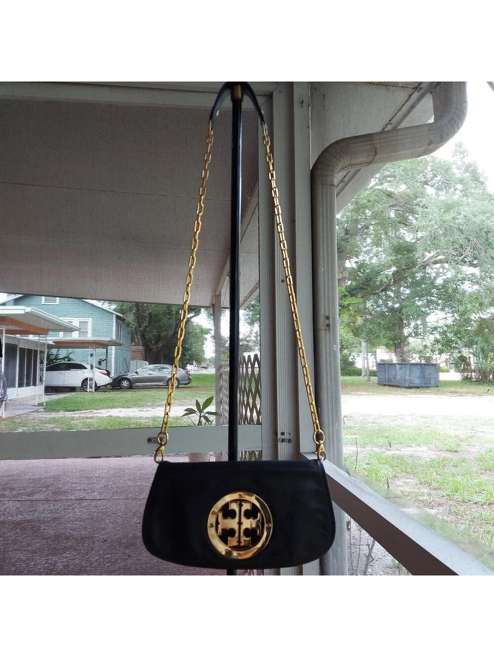 Tory Burch Reva black leather clutch bag